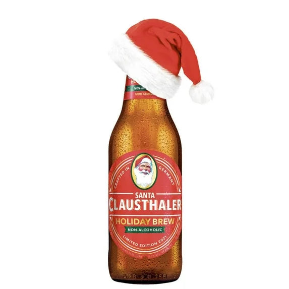 Bottle of Santa Clausthaler Holiday Brew with a Santa hat on a white background