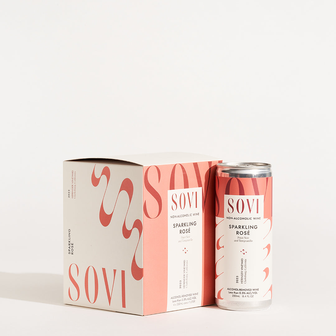 A 4-pack of Sovi Sparkling Rosé cans with a box, featuring pink and white branding design.