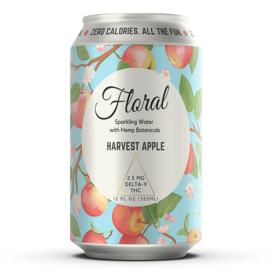A can of Floral Sparkling Water with Hemp Botanicals, Harvest Apple flavor, displaying an apple-themed design with red apples and apple blossoms.
