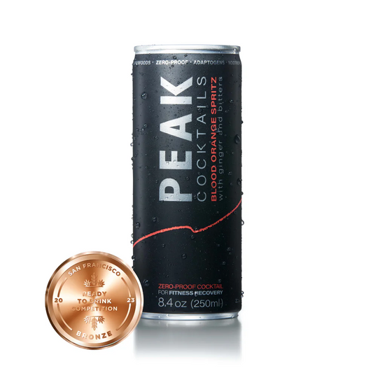 A can of Peak Cocktails Blood Orange Spritz with an image of a bronze award medallion.