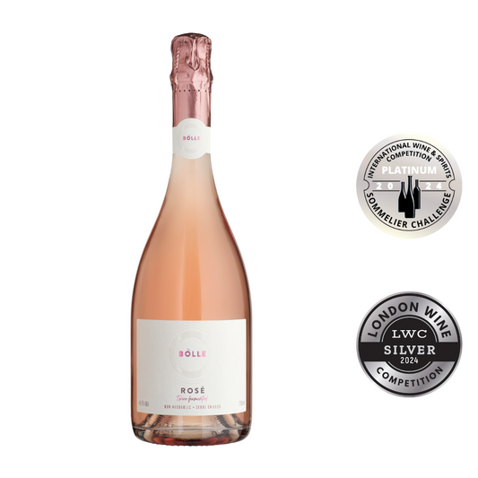 The image shows a bottle of Bolle Rose wine with a label, cork, and a award badge indicating it won a Platinum Medal at the 2024 IWS Sommelier Challenge.