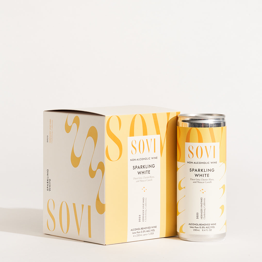 A 4-pack of Sovi Sparkling White canned wine with its packaging, featuring yellow and white colors with the brand name Sovi.