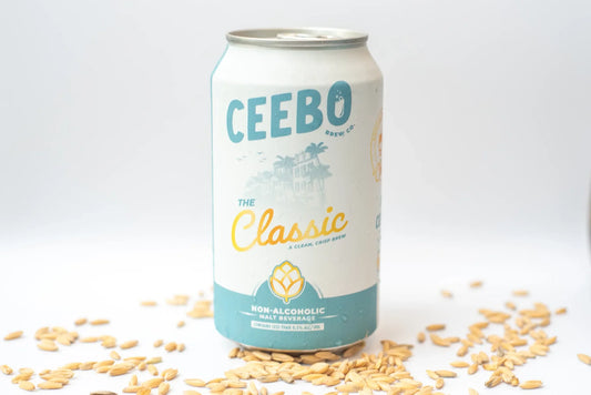 Ceebo non-alcoholic beer can with pine seeds on a white background