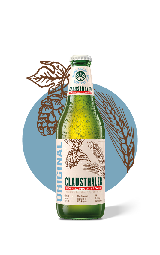 Green bottle of Clausthaler non-alcoholic beer with label on a white background