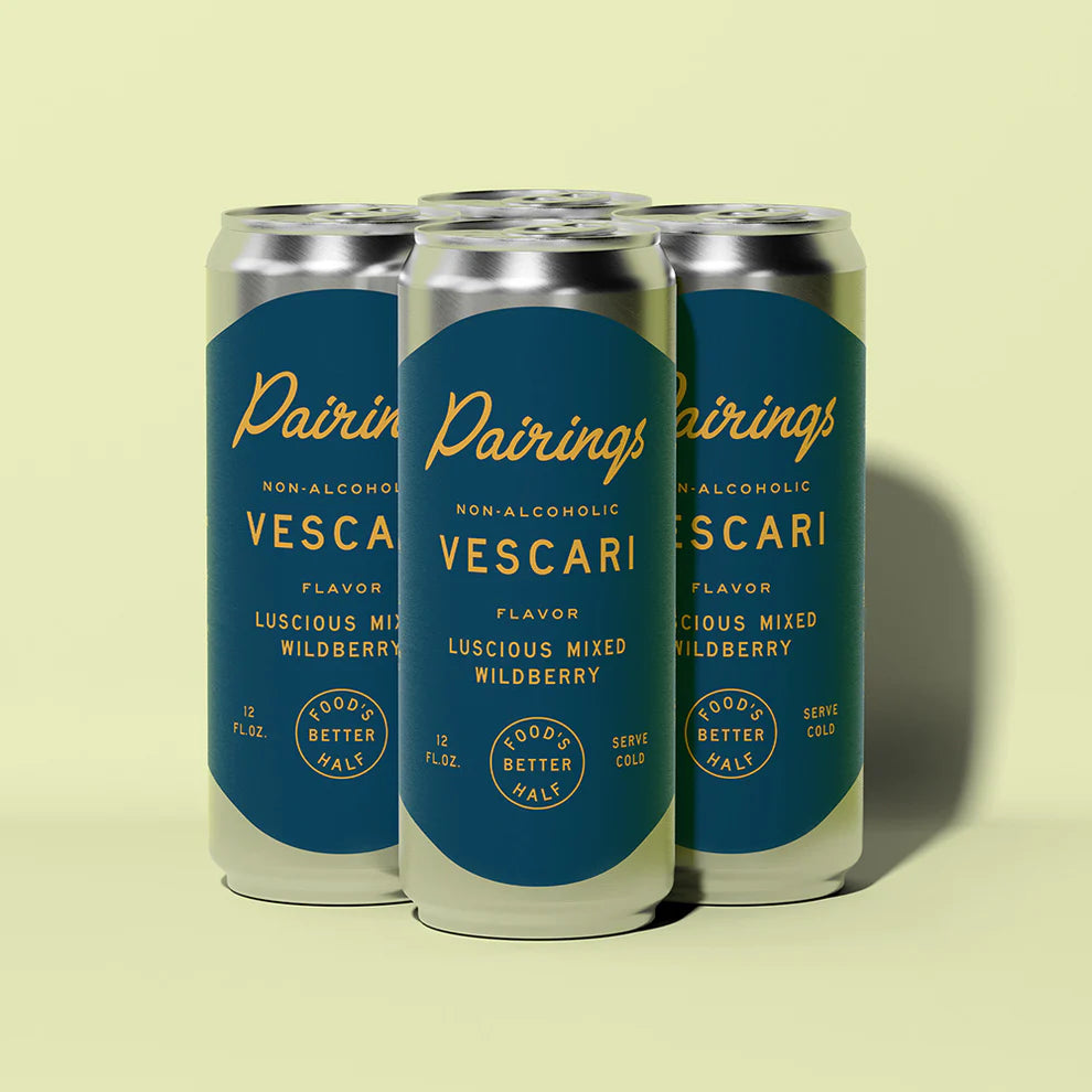 Three cans of Pairings Vescari non-alcoholic mixed wildberry flavor on a light yellow background