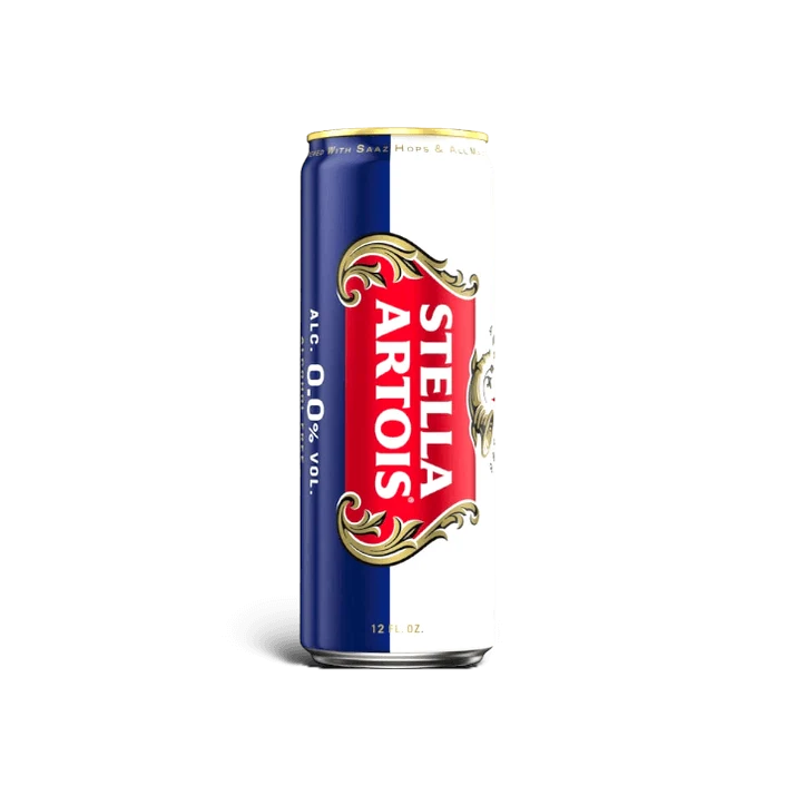 A 12 fl oz can of Stella Artois 0.0% Vol alcohol-free beer, featuring its classic blue and white design with a prominent red and gold logo on the front, set against a plain white background.